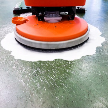 A wax cleaner from a Cleaning Company in Peoria IL, helping shine a commercial floor