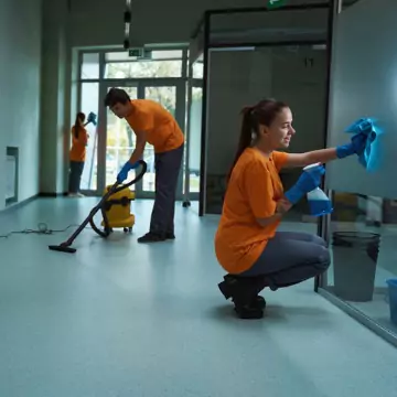 Workers are seen cleaning an office building. Corporate Clean is the best of the Cleaning Companies in Dunlap IL.