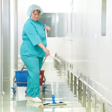 A cleaner is seen at work. Corporate Clean performs Healthcare Cleaning in Morton IL.
