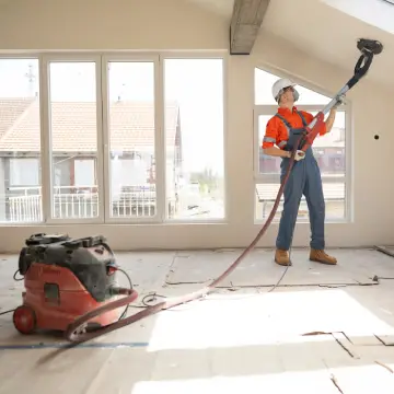 Preparing a Facility for Post-Construction Cleaning 1 A team member of Corporate Clean works after a builder worked on Preparing a Facility for Post-Construction Cleaning